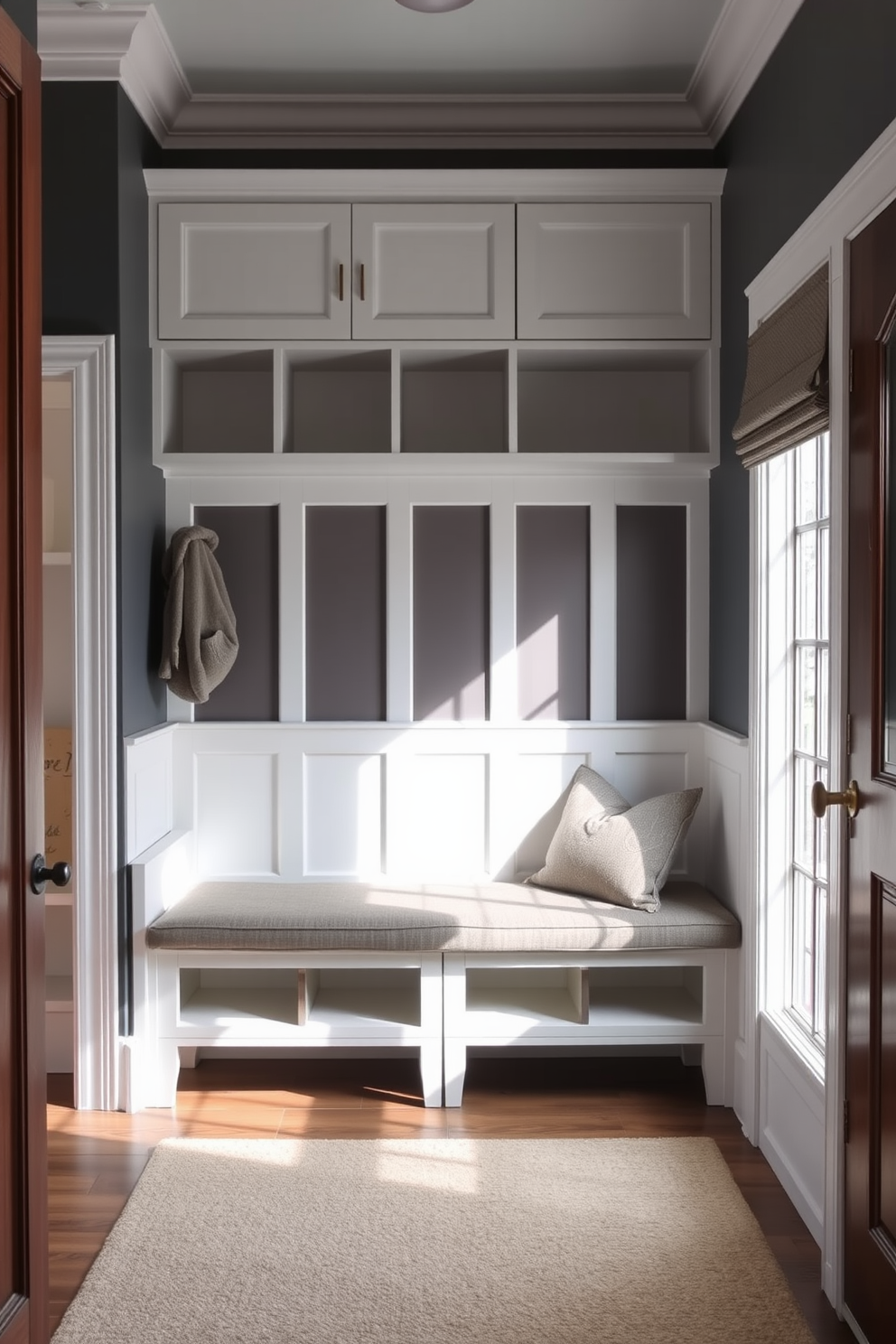 A stylish mudroom featuring a bench with a backrest for comfort. The bench is upholstered in a durable fabric and positioned against a wall with built-in storage cubbies above. The space is accented with a soft area rug beneath the bench, adding warmth to the entryway. Natural light floods in from a nearby window, illuminating the functional yet inviting atmosphere.