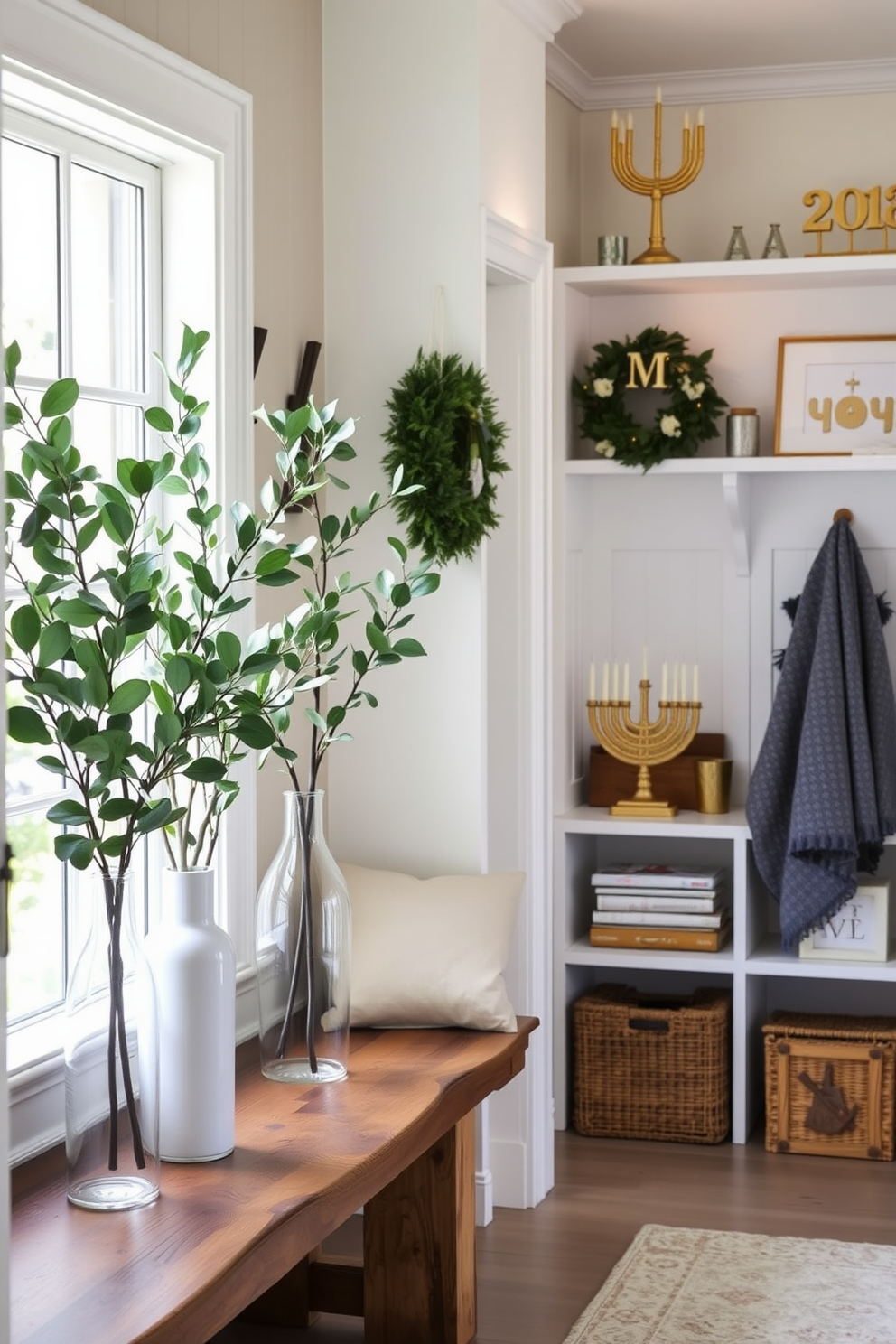 A serene mudroom filled with natural light. Eucalyptus branches in elegant vases are placed on a rustic wooden bench, enhancing the space's organic feel. Festive decorations for Hanukkah adorn the walls and shelves. A beautifully arranged display of menorahs and dreidels complements the warm ambiance of the room.