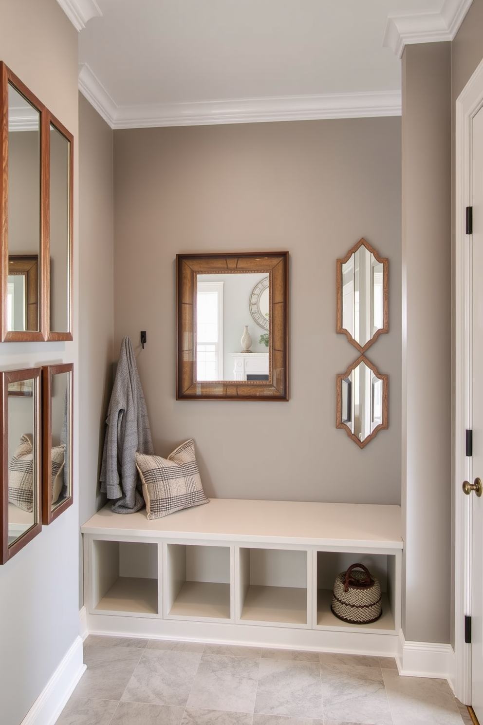 A stylish mudroom adjacent to the family room features decorative mirrors that reflect natural light and create an illusion of spaciousness. The walls are painted in a soft gray, and the flooring is a durable tile that can withstand heavy foot traffic. The mudroom includes a built-in bench with plush cushions and hooks for hanging coats and bags. A decorative mirror with a rustic frame is mounted above the bench, adding both functionality and charm to the space.