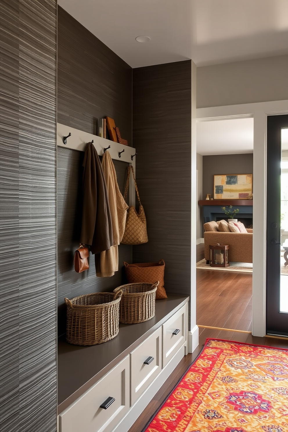 Textured wall panels create a striking focal point in the mudroom, enhancing the overall aesthetic with depth and character. The space features a built-in bench with storage underneath, complemented by hooks for coats and bags, seamlessly connecting to the adjacent living room. Natural light floods the mudroom through a large window, illuminating the textured panels and creating a warm, inviting atmosphere. Stylish baskets are placed on the bench for organization, while a vibrant rug adds a pop of color and comfort underfoot.