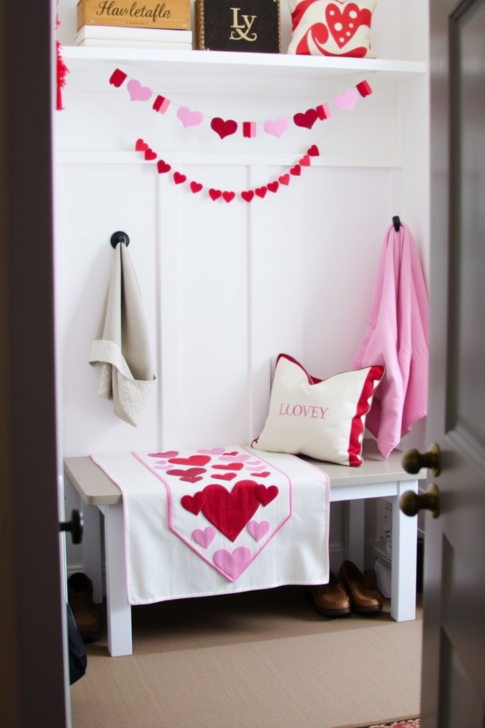 A charming mudroom decorated for Valentine's Day features a seasonal table runner adorned with hearts, adding a festive touch to the space. The walls are painted in soft pastel colors, and a small bench with throw pillows creates a cozy nook for putting on shoes.