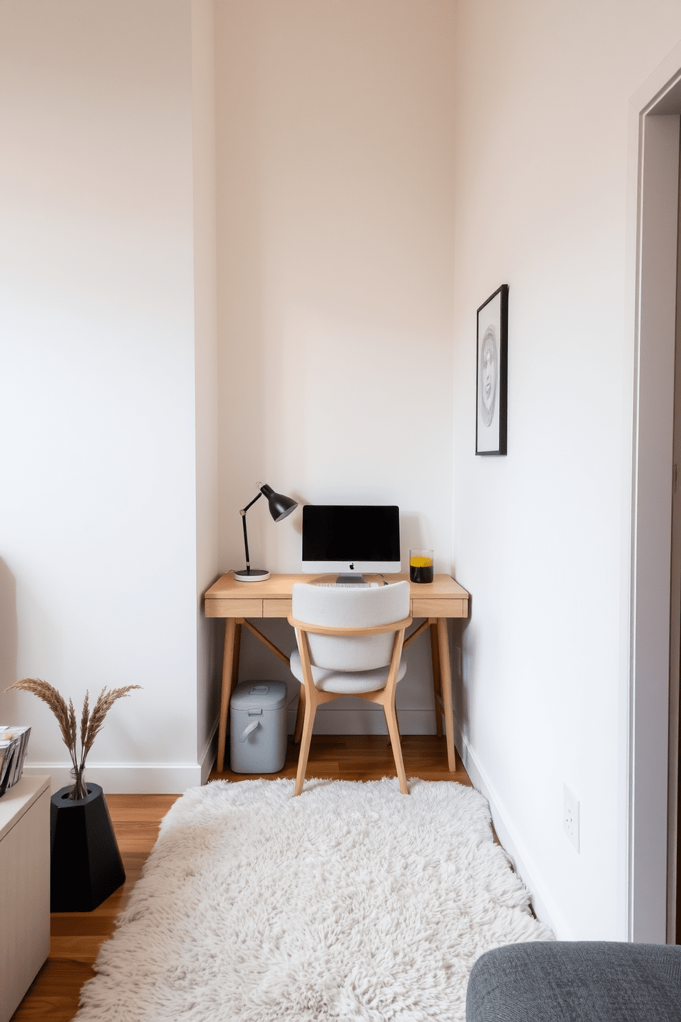 A cozy living area in a narrow apartment featuring a small desk tucked into a corner. The desk is made of light wood and paired with a comfortable chair, creating a functional workspace without overwhelming the space. The walls are painted in a soft, neutral tone, enhancing the sense of openness. A plush area rug lies beneath the desk, adding warmth and texture to the room while complementing the overall decor.