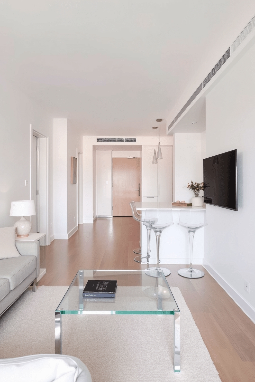 A narrow apartment designed with a focus on transparency features clear acrylic furniture that enhances the sense of space and light. The living area includes a transparent coffee table and chairs, allowing for an airy atmosphere while maintaining functionality. The kitchen is equipped with sleek, transparent bar stools at a minimalist island, creating an inviting and open feel. Soft, neutral colors on the walls and accents complement the transparent elements, making the apartment feel larger and more cohesive.