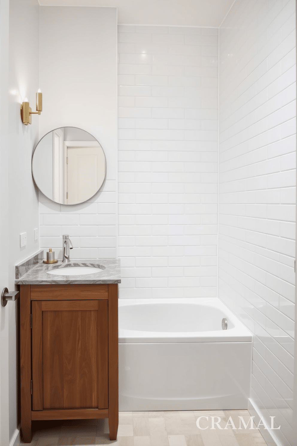 A narrow bathroom design featuring a small soaking tub positioned against one wall. The tub is surrounded by sleek white tiles, creating a clean and modern aesthetic. Opposite the tub, there is a compact wooden vanity with a polished stone countertop and a single sink. Above the vanity, a simple round mirror reflects the soft lighting from stylish wall sconces.