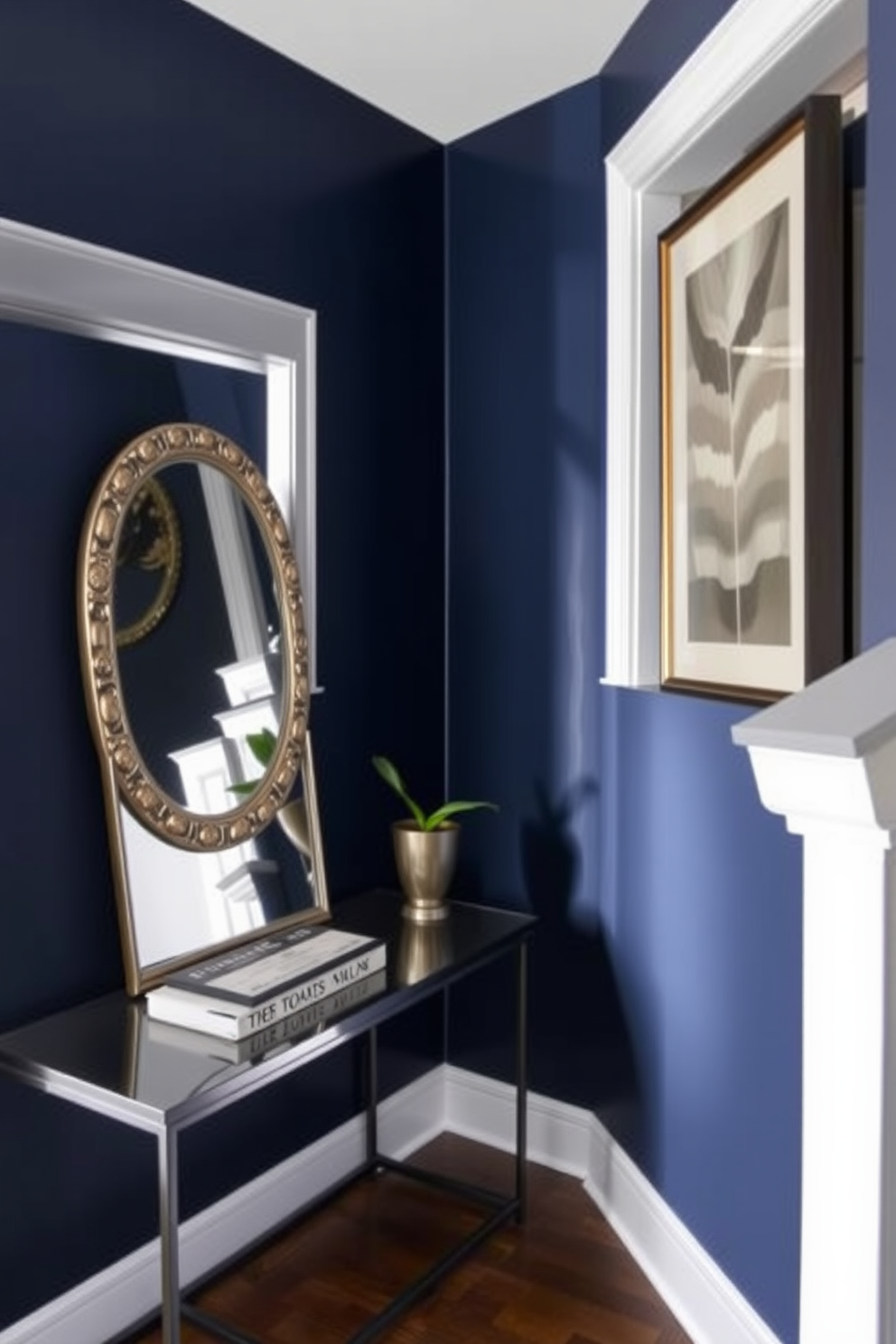 Accent wall with bold paint color. The wall is painted in a deep navy blue, creating a striking focal point in the room. Narrow entryway design ideas. A sleek console table is positioned against the wall, topped with a decorative mirror and a small potted plant.