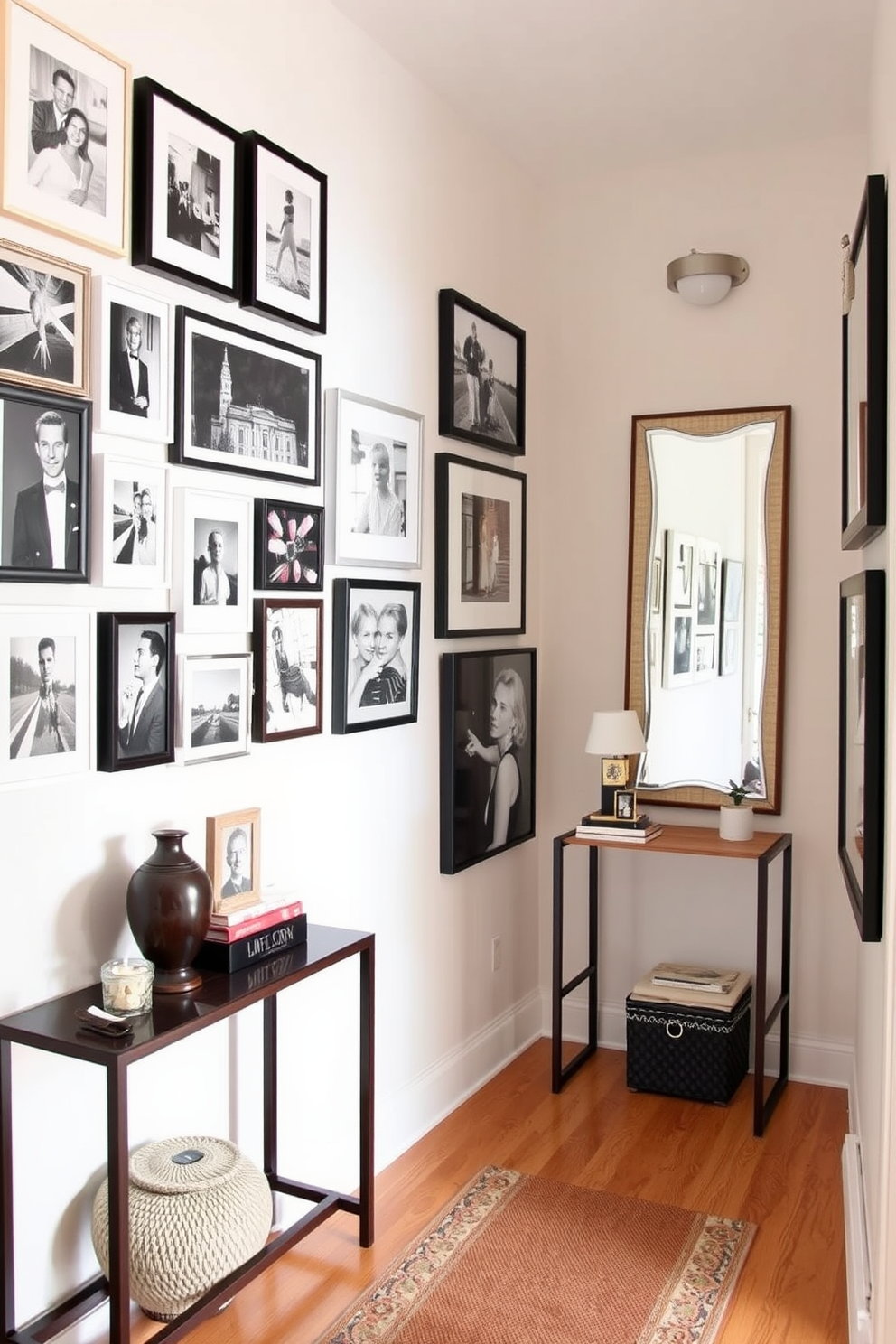 Create a gallery wall with a mix of framed photos in various sizes and styles. The wall features a combination of black and white images alongside vibrant color prints, arranged in a visually appealing layout. Narrow foyer design ideas include a slim console table with decorative items above and a stylish mirror. The space is enhanced with wall-mounted lighting and a runner rug that adds warmth and texture.