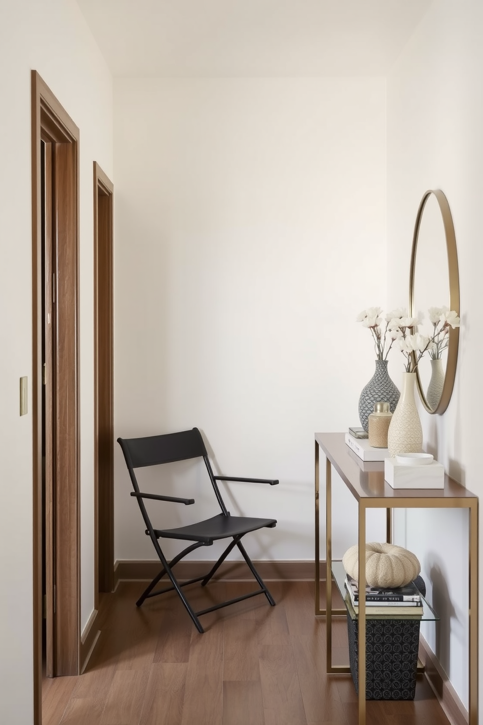 A narrow foyer featuring a sleek folding chair against one wall to maximize space efficiency. The walls are painted in a soft neutral tone, complemented by a stylish console table adorned with decorative items.