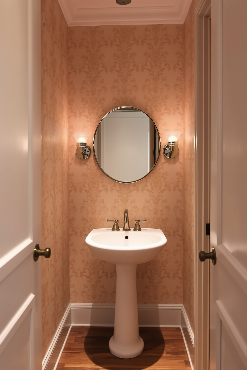 A narrow powder room features soft ambient lighting that creates a warm and inviting atmosphere. The walls are adorned with elegant wallpaper in a muted tone, and a sleek pedestal sink is positioned to maximize space. A large round mirror with a delicate frame hangs above the sink, reflecting the gentle glow of wall sconces on either side. The flooring consists of polished wood or stylish tiles, adding a touch of sophistication to the compact design.