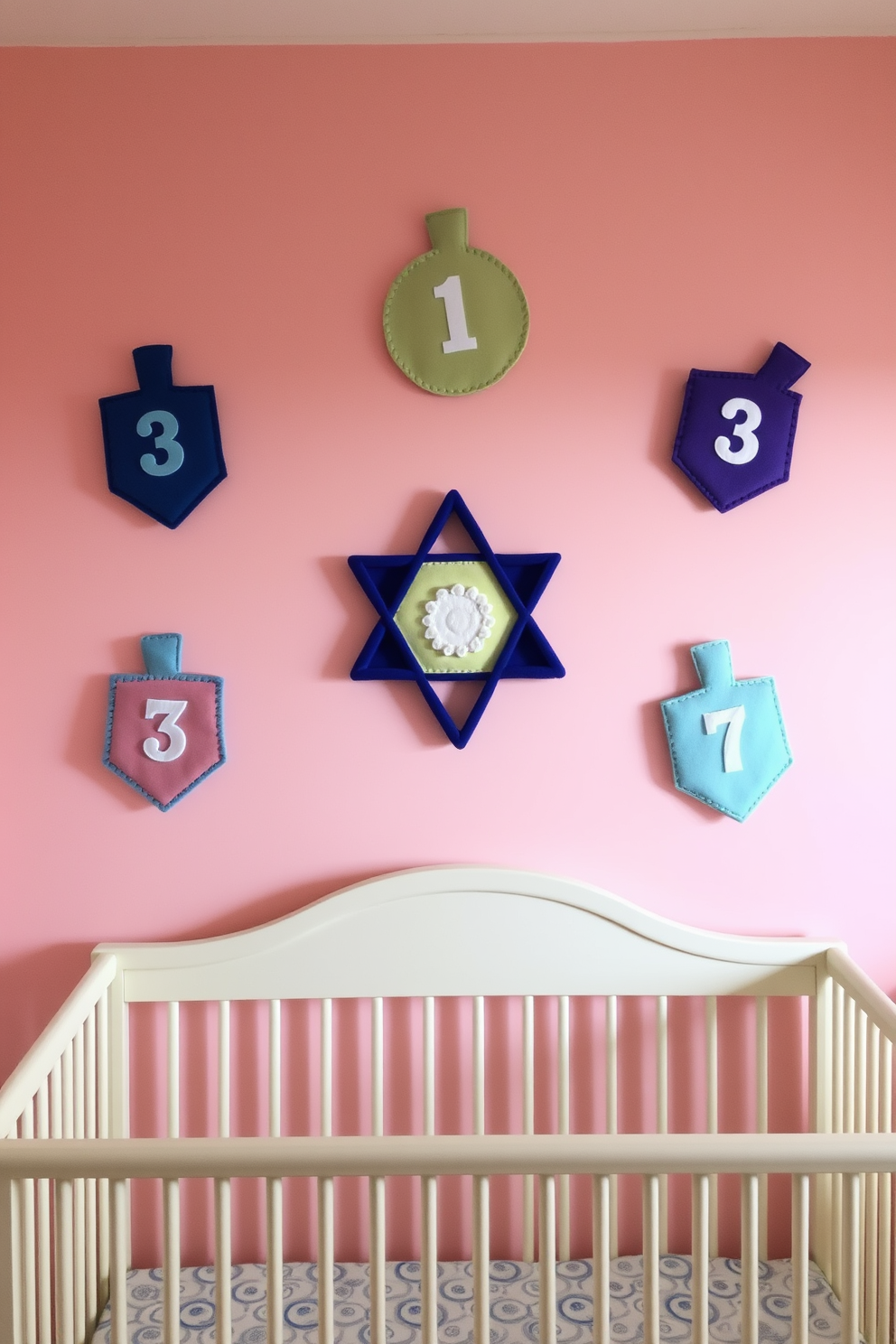 A cozy nursery adorned with felt dreidel shapes as wall decor. The walls are painted in soft pastel colors, creating a warm and inviting atmosphere for the celebration of Hanukkah.