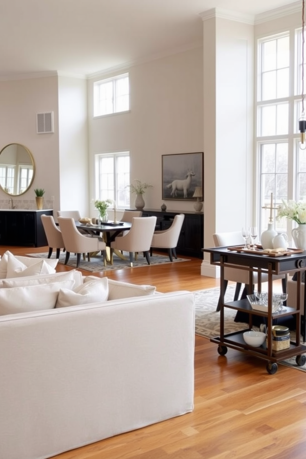 A stylish open floor plan dining room that seamlessly integrates a bar cart for entertaining. The dining table is surrounded by elegant upholstered chairs, and the bar cart features a mix of glassware and decorative items, enhancing the room's inviting atmosphere. The walls are painted in a soft neutral tone, complementing the warm wooden flooring. Large windows allow natural light to flood the space, creating a bright and airy feel perfect for gatherings.