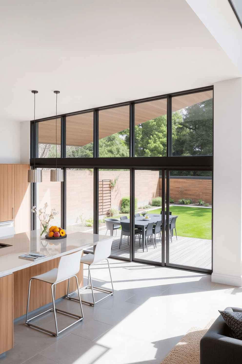 A modern open kitchen design featuring large glass doors that seamlessly connect the indoor space with the outdoor patio. The kitchen island is adorned with sleek bar stools, and the cabinetry is a mix of white and natural wood finishes, creating a bright and inviting atmosphere.