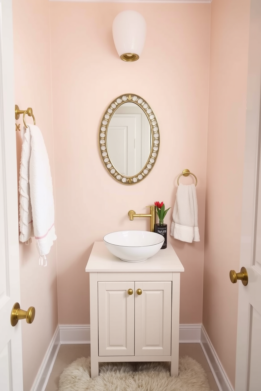 A chic powder room featuring stylish towel racks that enhance the overall decor. The walls are painted in a soft pastel hue, and the towel racks are elegantly mounted in brushed gold, providing a touch of luxury. The space includes a compact vanity with a sleek vessel sink and a decorative mirror above. A plush rug lies beneath the vanity, adding warmth and texture to the room.