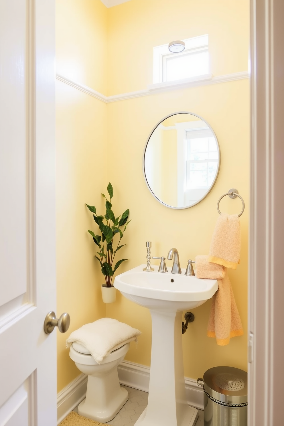 A bright and inviting powder room features pale yellow walls that create a cheerful ambiance. The space is accented with white trim and a sleek pedestal sink, complemented by a round mirror with a simple silver frame. To enhance the lightness of the room, a small window allows natural light to flood in. Decorative elements like a potted plant and soft, fluffy towels in coordinating colors add warmth and comfort to the design.