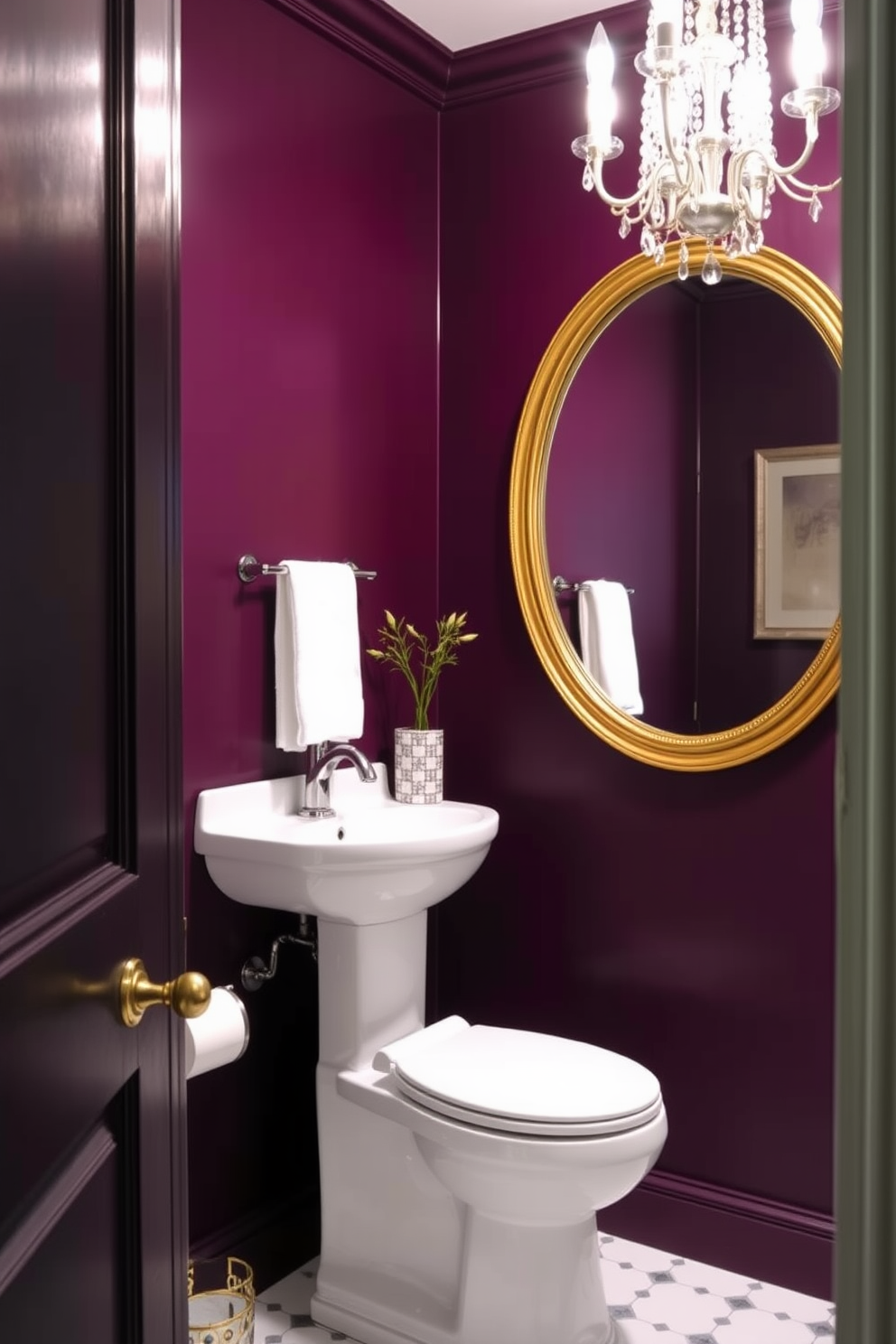 A striking powder room featuring dark plum walls that create a bold and dramatic atmosphere. The space is accented with white fixtures, including a sleek pedestal sink and a modern toilet, enhancing the richness of the color. The room is illuminated by a stylish chandelier that adds elegance and sophistication. A large round mirror with a gold frame hangs above the sink, reflecting the luxurious ambiance of the space.