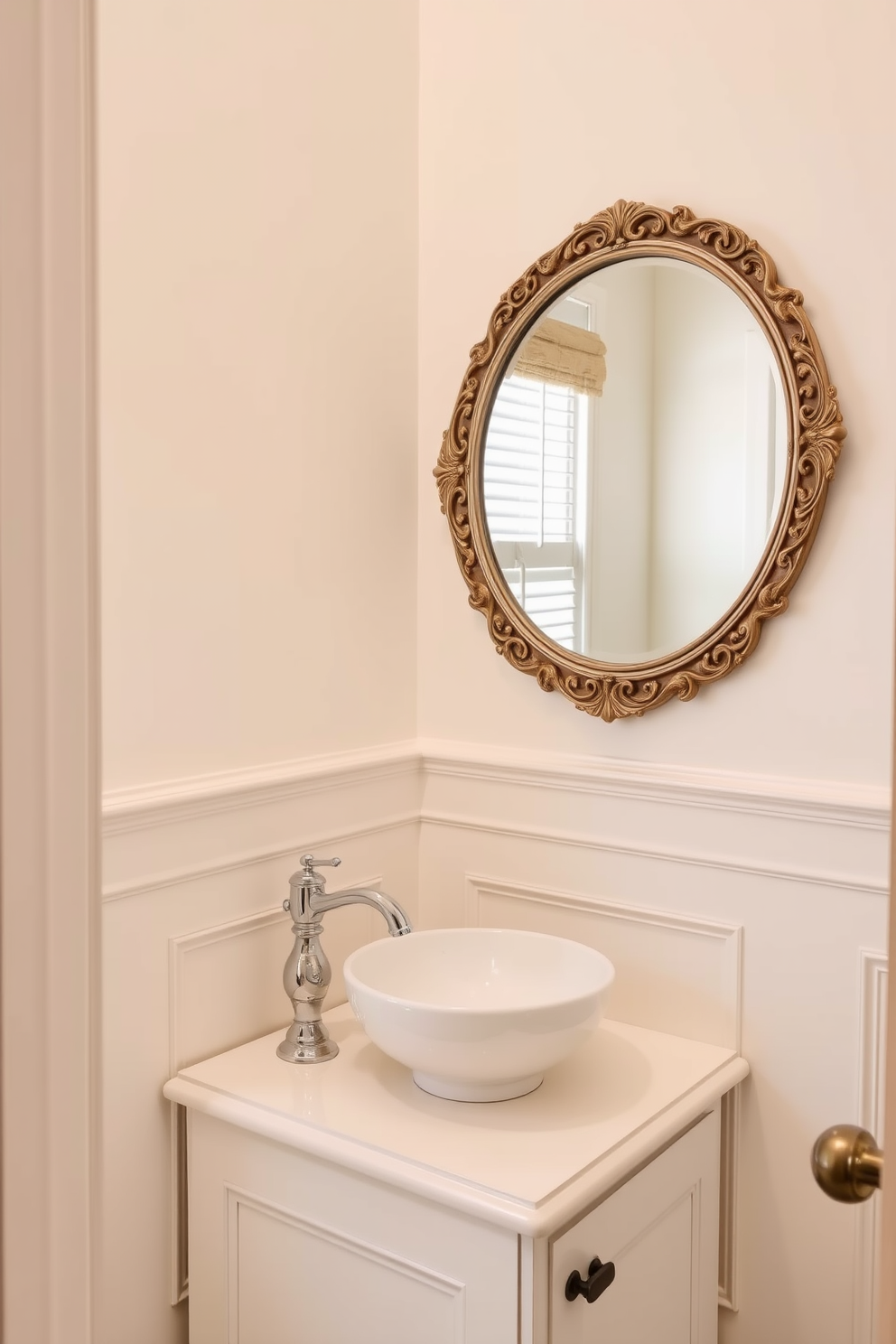 A classic cream powder room features elegant wainscoting that adds depth to the walls. The soft cream hue creates a warm and inviting atmosphere, perfect for a timeless design. The vanity is adorned with a polished chrome faucet and a white vessel sink that complements the cream walls. A large round mirror with an ornate frame reflects the light, enhancing the room's brightness and charm.