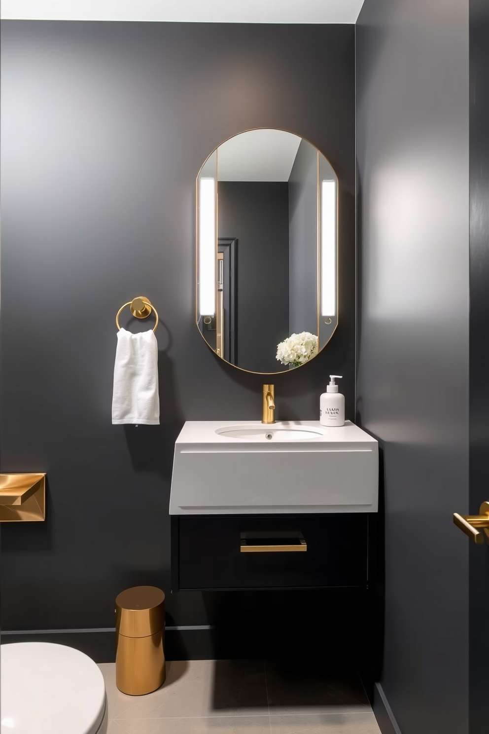 A modern powder room featuring charcoal gray walls that exude sophistication and elegance. The space includes sleek fixtures and a minimalist design that enhances the contemporary aesthetic. A stylish floating vanity with a white countertop contrasts beautifully with the dark walls. Accents of gold in the hardware and accessories add a touch of luxury to the overall design.