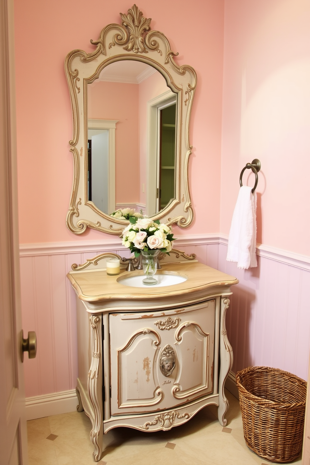 A shabby chic vanity with a distressed finish is the centerpiece of this powder room. The vanity features ornate detailing and is complemented by a vintage-style mirror with a weathered frame. Soft pastel colors adorn the walls, creating a warm and inviting atmosphere. A charming floral arrangement sits atop the vanity, adding a touch of elegance to the space.