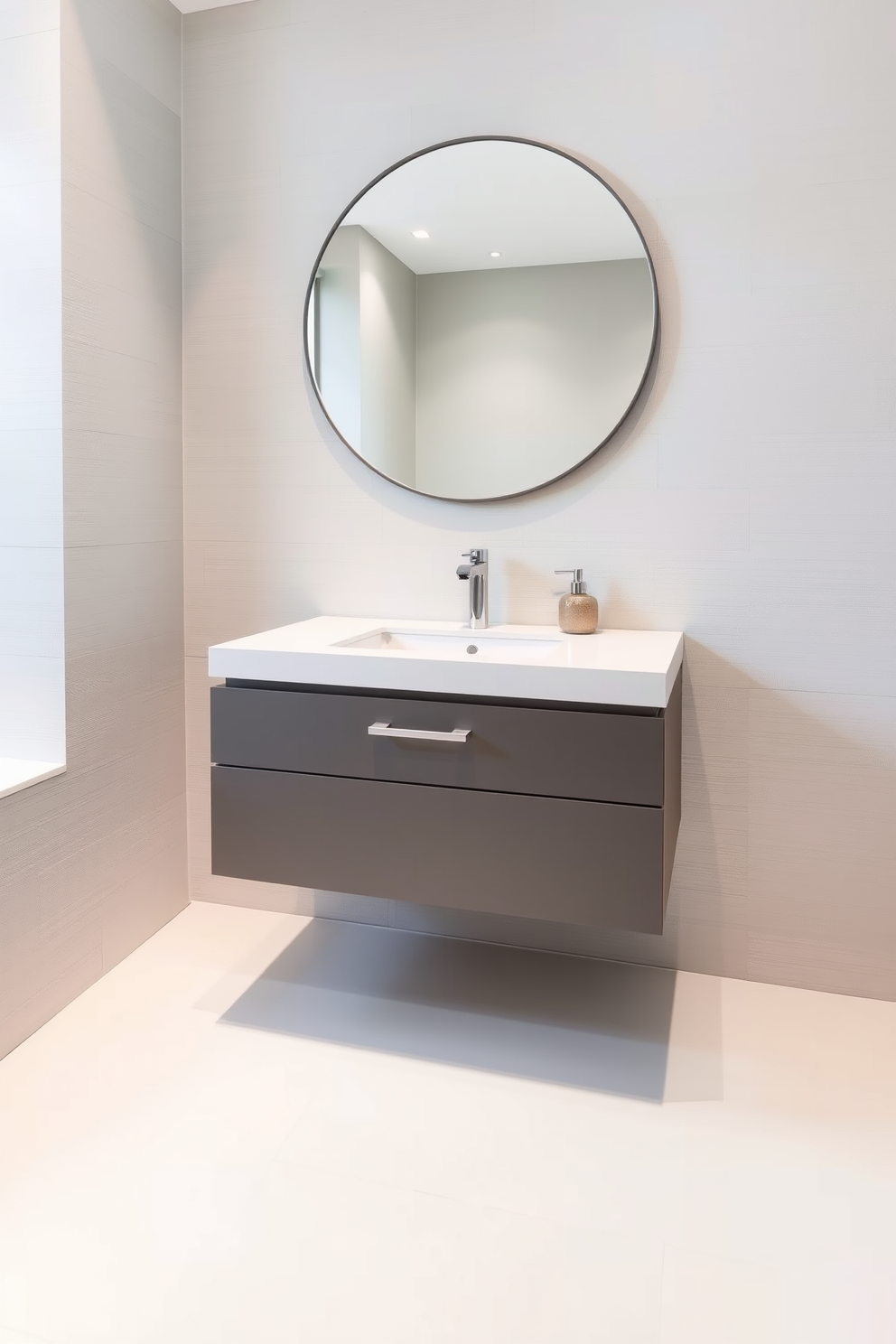 A sleek floating vanity with a minimalist design is the centerpiece of this powder room. The vanity features a smooth white countertop and integrated sink, complemented by simple chrome fixtures. The walls are adorned with a subtle textured finish in soft gray, creating a calming atmosphere. A large round mirror hangs above the vanity, reflecting the elegant simplicity of the design.