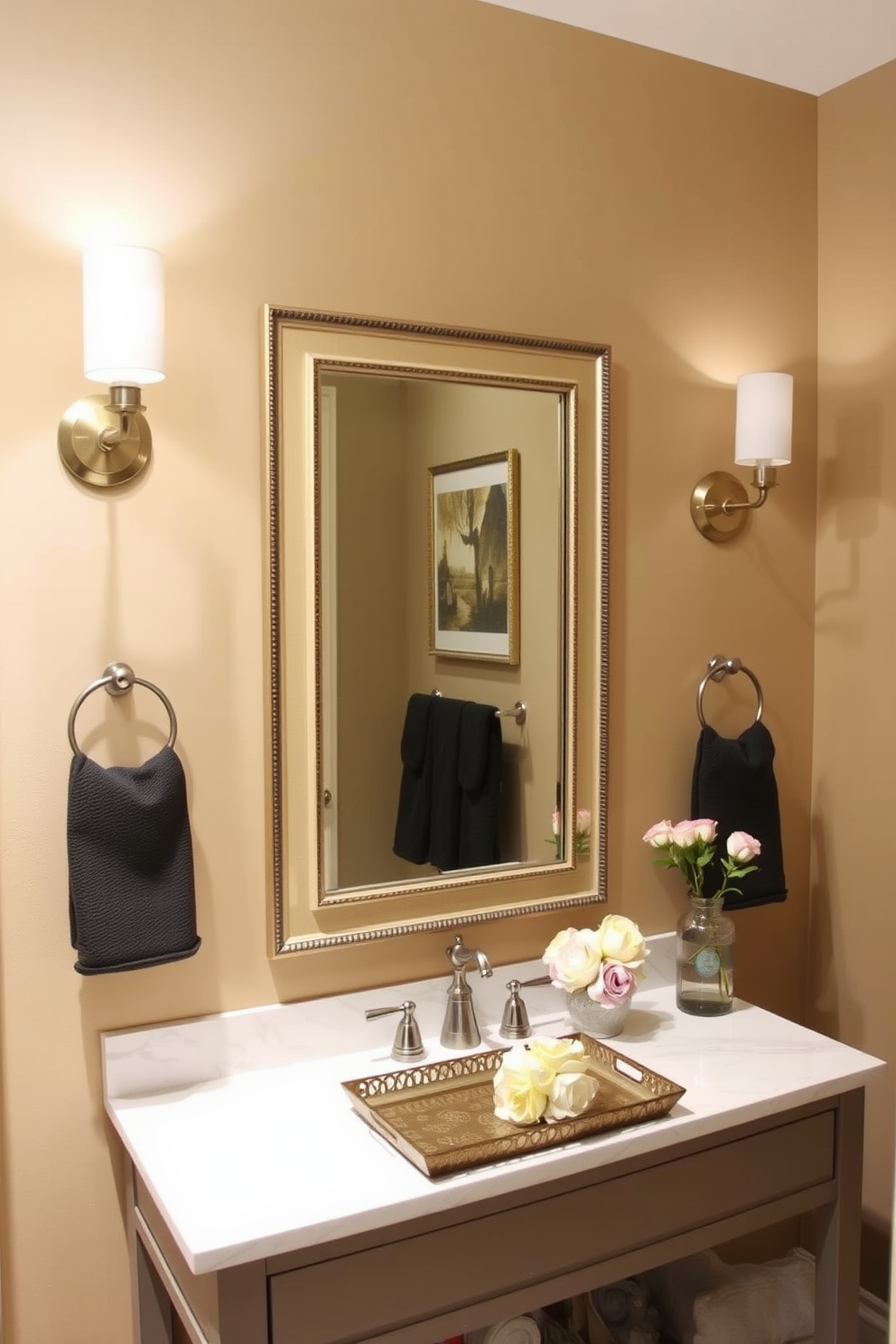 A chic powder room adorned with stylish wall sconces that provide soft ambient lighting. The sconces are elegantly mounted on either side of a beautifully framed mirror, enhancing the overall aesthetic of the space. The walls are painted in a warm neutral tone, complemented by tasteful artwork that adds a touch of personality. A small console table beneath the mirror displays a decorative tray and a fresh bouquet of flowers, creating an inviting atmosphere.