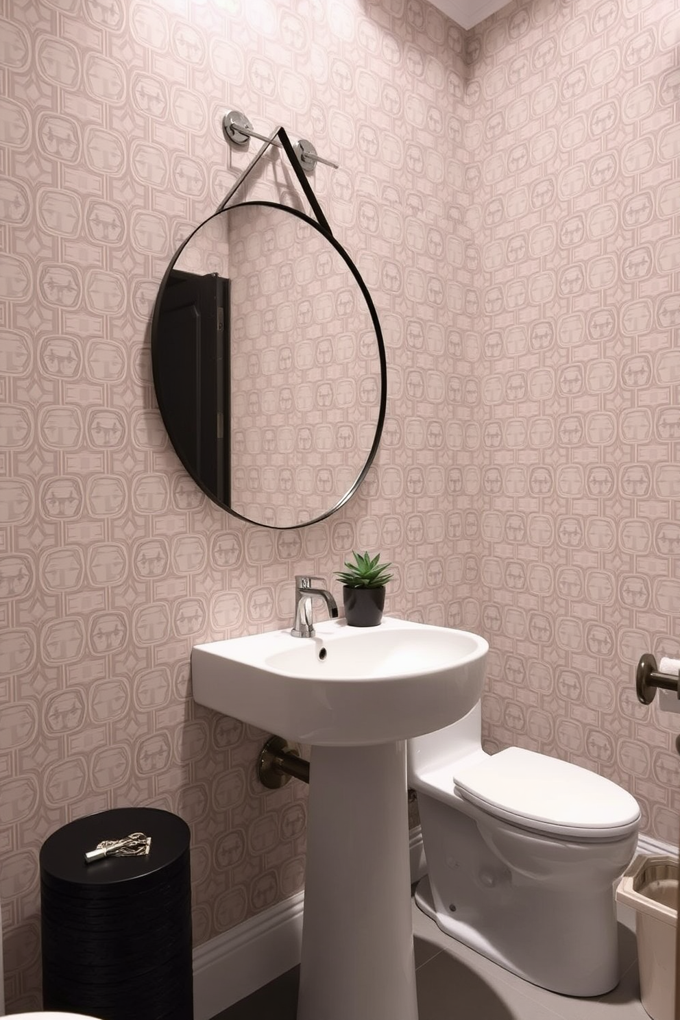 A chic powder room featuring wallpaper with a subtle geometric pattern in soft taupe and cream tones. The space is accented by a sleek white pedestal sink and a round mirror with a thin black frame, creating a modern yet inviting atmosphere. The walls are adorned with the elegant wallpaper, while the floor is finished with light gray tiles for a cohesive look. A small potted plant sits on the sink, adding a touch of greenery to the minimalist design.