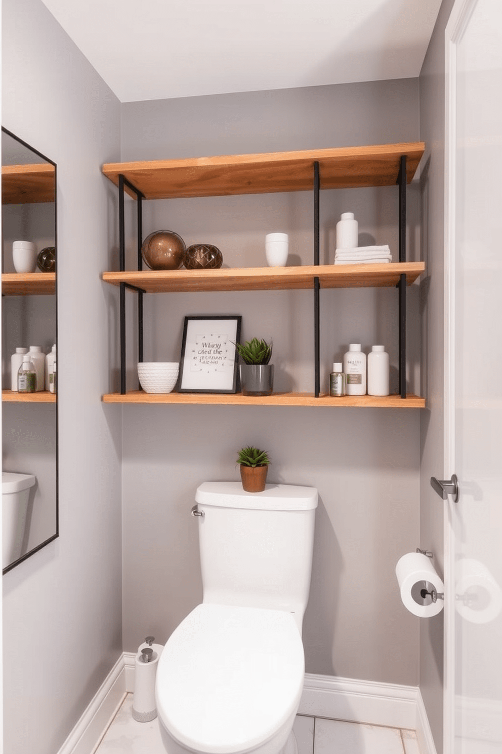 A functional shelving unit is installed above the toilet, providing ample space for decorative items and essential toiletries. The shelves are made of natural wood with a warm finish, complementing the overall design of the bathroom. The walls are painted in a soft gray, creating a serene atmosphere while the floor features elegant white tiles. A small potted plant sits on one of the shelves, adding a touch of greenery to the space.