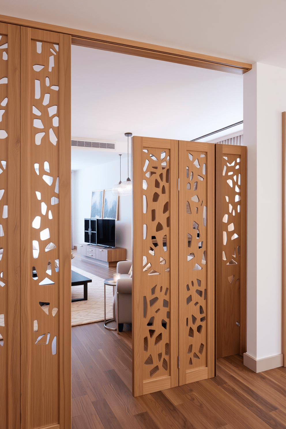 A stylish railroad apartment featuring decorative room dividers that create distinct living spaces while maintaining an open feel. The dividers are made of natural wood with intricate cut-out patterns, providing both privacy and aesthetic appeal. The living area showcases a cozy seating arrangement with a plush sofa and a coffee table, separated from the dining space by an elegant divider. Soft lighting from pendant fixtures enhances the warmth of the room, complementing the neutral color palette throughout the apartment.