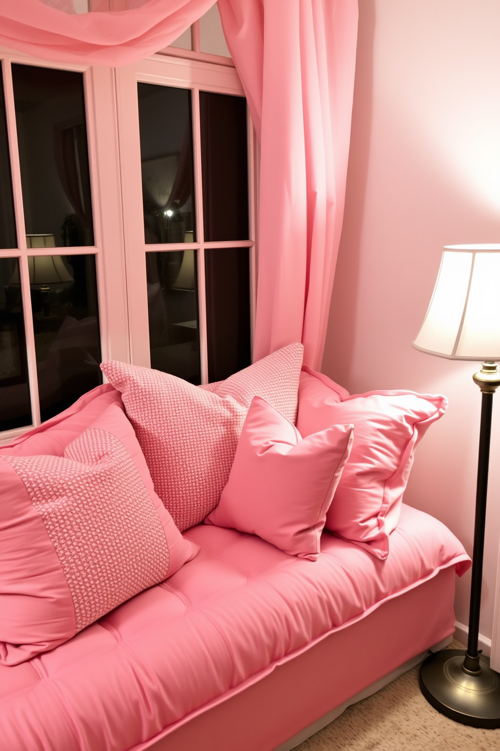 A cozy reading nook adorned with layered cushions in various shades of pink creates a warm and inviting atmosphere. Soft lighting from a nearby lamp enhances the romantic vibe, perfect for Valentine's Day decorating ideas.