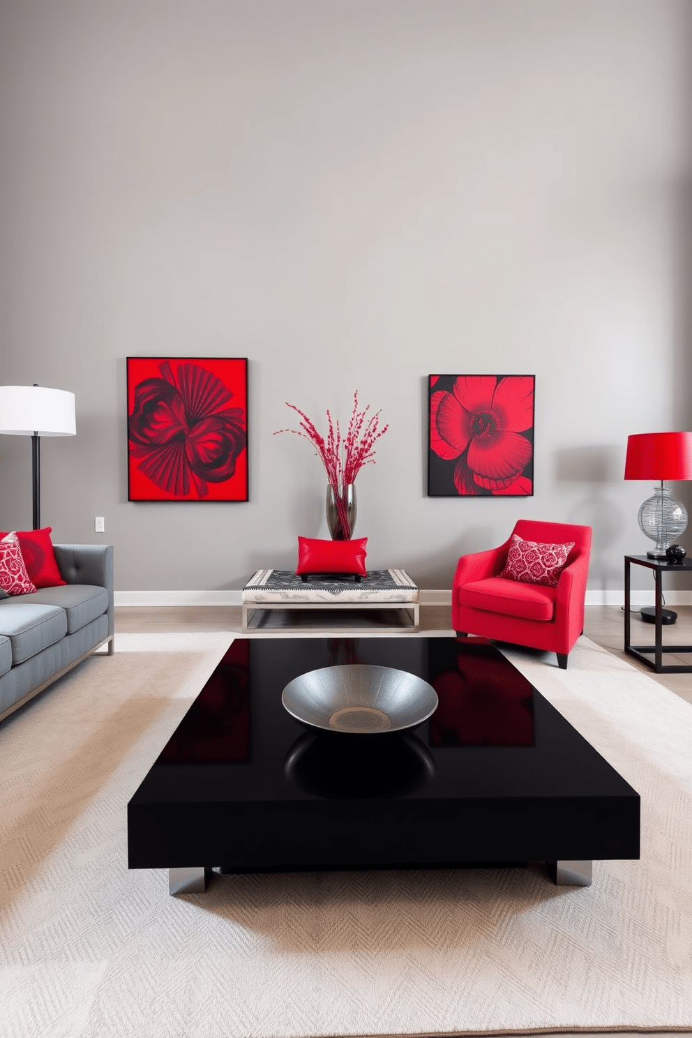 A contemporary living space featuring a bold red and gray color scheme. The walls are painted in a soft gray, while vibrant red accents are incorporated through cushions and artwork. The furniture includes a sleek gray sofa paired with a striking red armchair. A modern coffee table in the center complements the color palette, with a decorative bowl adding a touch of elegance.