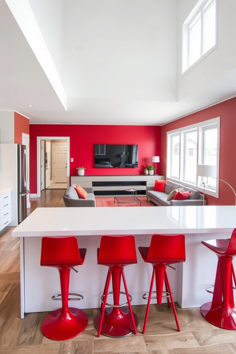 A modern kitchen island featuring sleek red bar stools that complement the contemporary design. The island has a white quartz countertop and is surrounded by bright, natural light from large windows. A stylish basement designed with a cozy lounge area featuring plush seating and a bold red accent wall. The space includes a mini bar with red stools, creating an inviting atmosphere for entertaining guests.