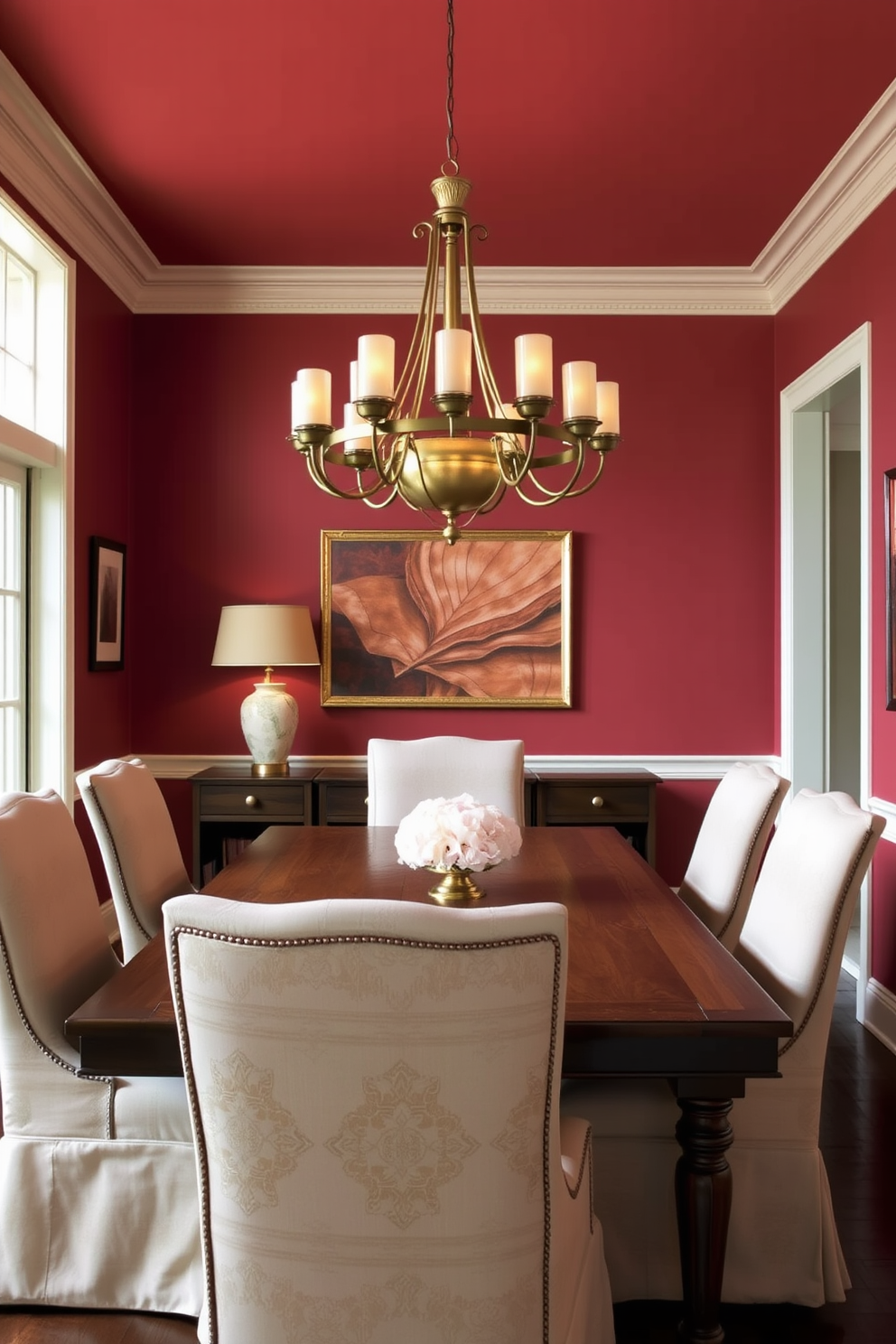 A serene dining room featuring muted red tones that create a calming atmosphere. The walls are painted in a soft red hue, complemented by a rich wooden dining table surrounded by elegant upholstered chairs. A large chandelier with warm lighting hangs above the table, enhancing the inviting ambiance. Decorative elements such as a tasteful centerpiece and framed artwork in coordinating colors add a touch of sophistication to the space.