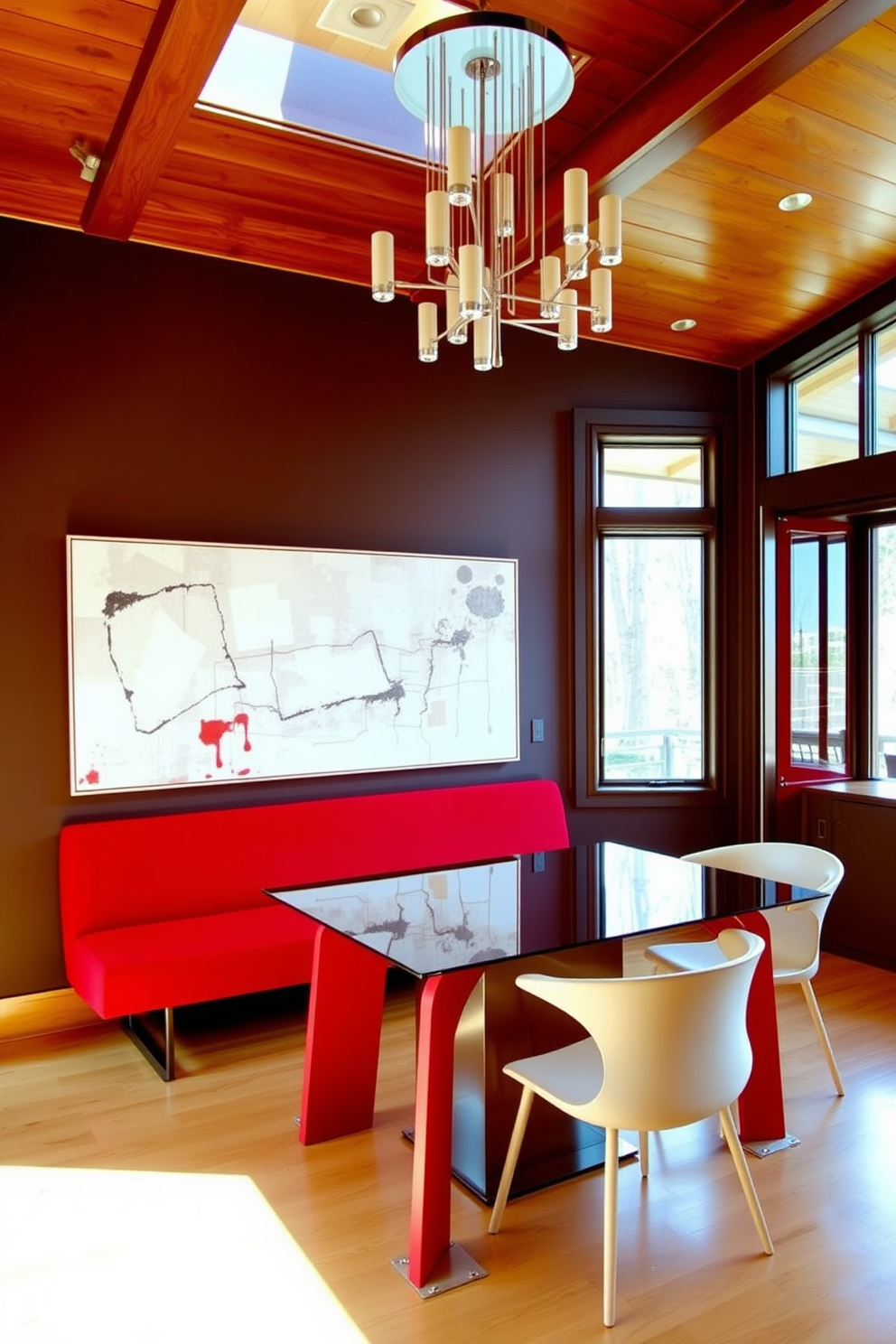 A contemporary red dining bench is positioned against a wall adorned with abstract art. The dining table features a sleek glass top, complemented by minimalist chairs in neutral tones that enhance the vibrant red of the bench. The room is illuminated by a modern chandelier that adds warmth to the space. Large windows allow natural light to flood in, creating an inviting atmosphere perfect for gatherings.