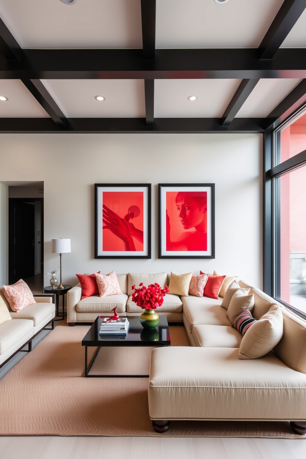 A vibrant family room featuring red wall art framed in sleek black frames. The space is designed for comfort, with a plush sectional sofa and a modern coffee table at the center.