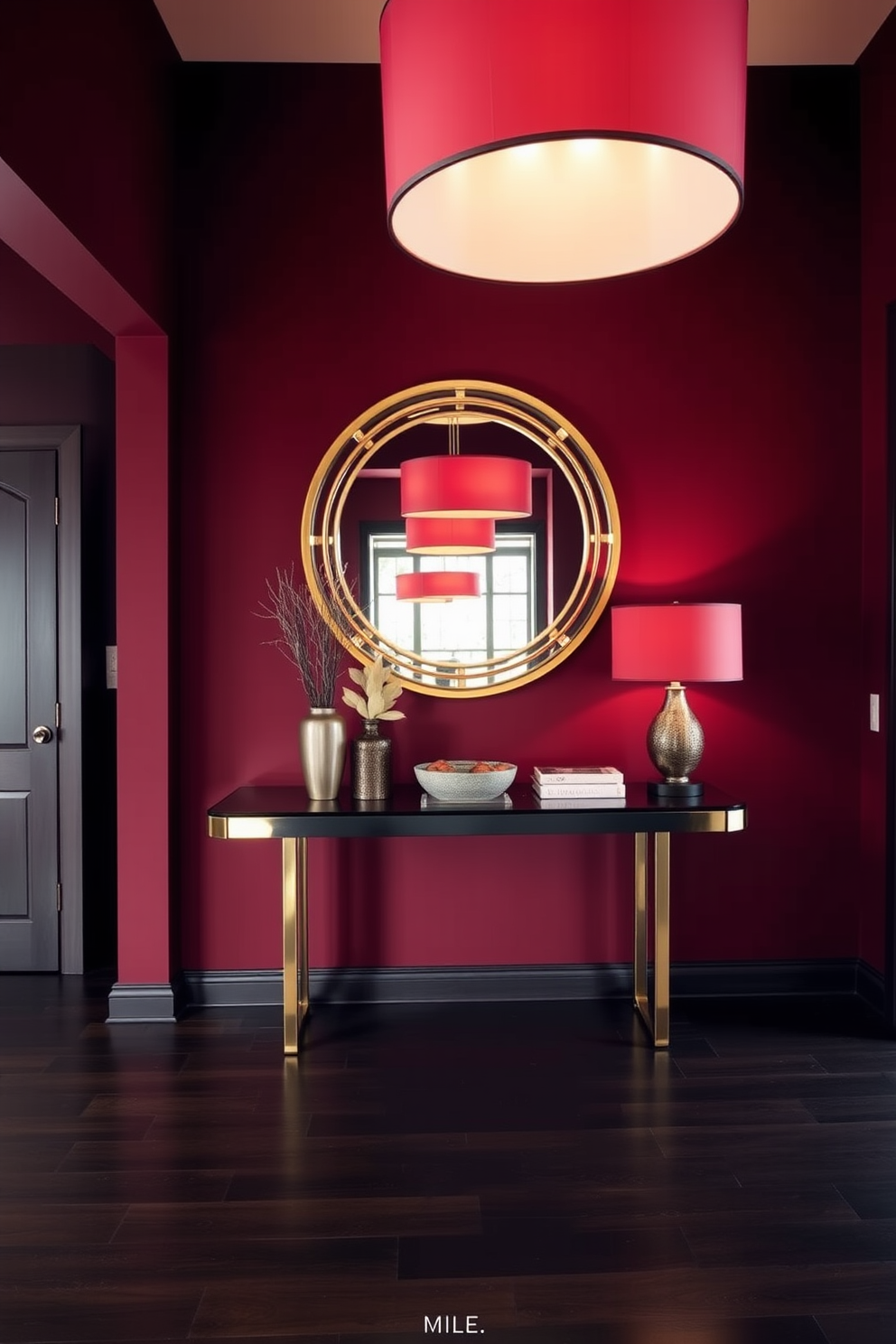 A striking foyer with layered lighting featuring elegant red lampshades that create a warm and inviting atmosphere. The walls are painted in a deep burgundy hue, complemented by a sleek console table adorned with decorative pieces. The floor is finished with polished dark hardwood, enhancing the rich color palette. A large round mirror hangs above the console, reflecting the soft glow of the lamps and adding depth to the space.