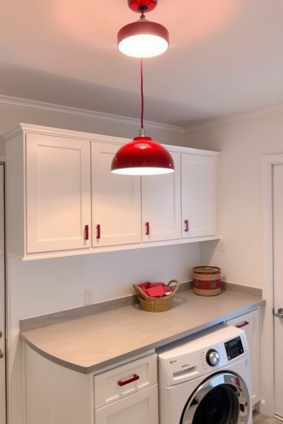 Chic red pendant lights hang gracefully from the ceiling, illuminating the space with a warm and inviting glow. The bold color adds a striking contrast against the soft white walls, creating a vibrant focal point in the room. The laundry room features sleek white cabinetry that complements the red accents, providing ample storage for laundry essentials. A stylish countertop in a light gray finish offers a practical workspace for folding clothes, while a decorative basket adds a touch of charm.