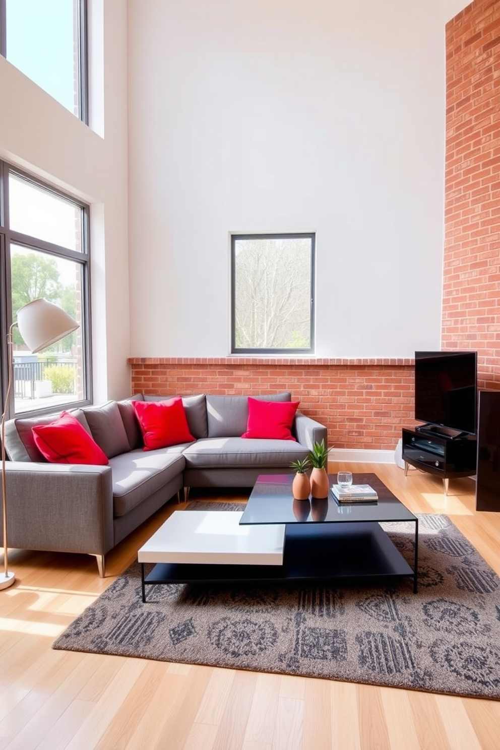 A stylish living room featuring an accent wall made of red brick that adds warmth and texture to the space. The room is furnished with a plush gray sofa, a sleek coffee table, and vibrant red accent pillows to complement the wall. Natural light floods the room through large windows, highlighting a modern area rug that ties the design together. A contemporary floor lamp stands in the corner, providing additional lighting and enhancing the inviting atmosphere.