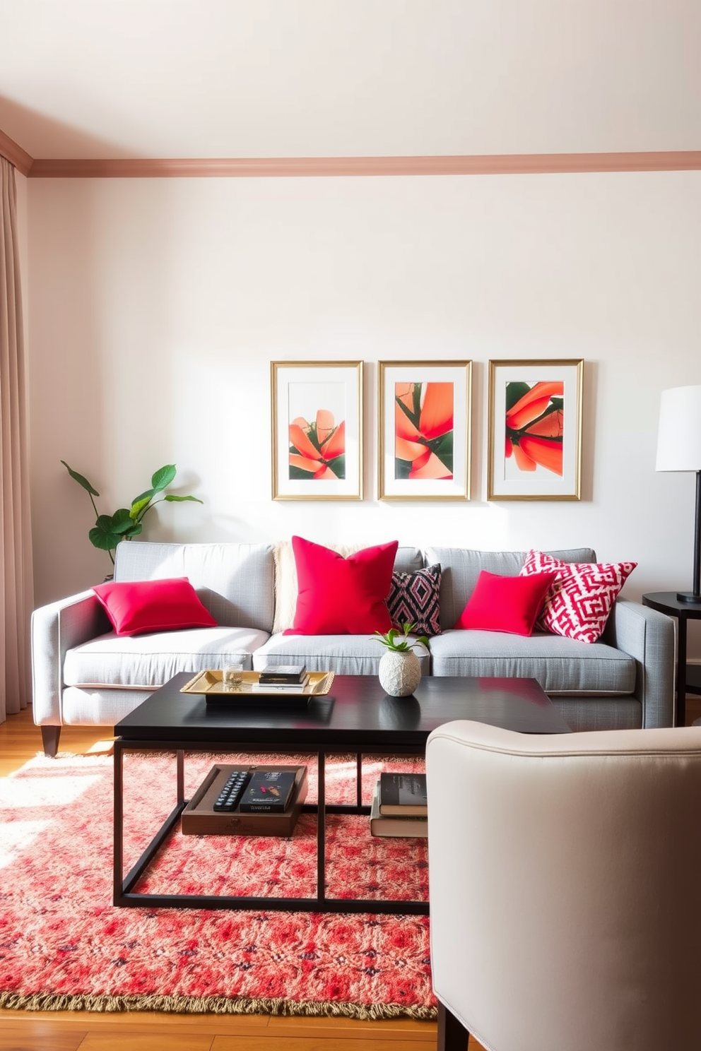 A vibrant living room featuring a gray couch adorned with bright red throw pillows that add a pop of color. The walls are painted in a soft neutral tone, and a stylish coffee table sits in front of the couch, complemented by a cozy area rug beneath.