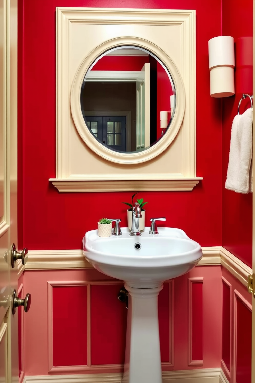 A vibrant red powder room featuring cream accents for a bright and inviting atmosphere. The walls are painted a bold red, while the trim and fixtures are in a soft cream, creating a striking contrast. A sleek pedestal sink with a polished chrome faucet stands against the red wall, complemented by a round cream mirror above it. Decorative elements include a small potted plant on the sink and a plush cream towel hanging nearby.