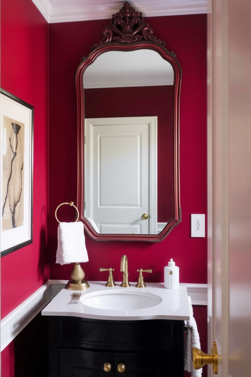 A vintage mirror framed in deep red hangs prominently on the wall, reflecting the elegant ambiance of the space. The powder room features rich, deep red walls that create a warm and inviting atmosphere, complemented by a sleek black vanity with gold fixtures.