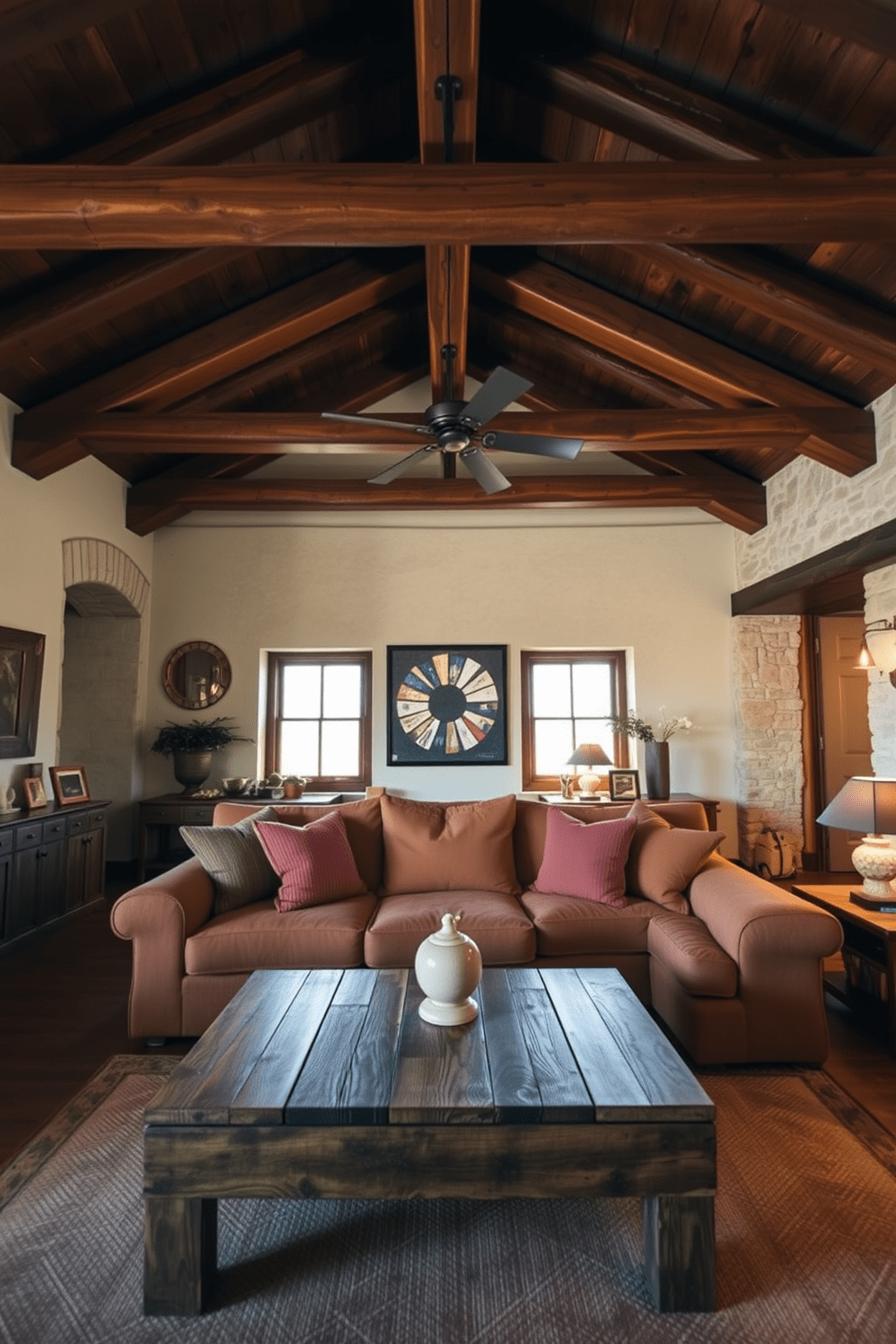 Warm wooden beams stretch across the ceiling, creating a cozy and inviting atmosphere. The walls are adorned with natural stone, complementing the rustic charm of the space. A large, comfortable sofa in earthy tones is positioned in the center, accented by textured throw pillows. A reclaimed wood coffee table sits in front, surrounded by vintage decor and warm lighting.