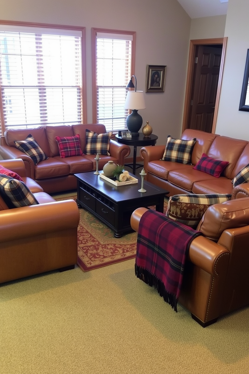 A cozy family room featuring warm leather sofas arranged around a central coffee table. Plaid accents in the throw pillows and blankets add a touch of rustic charm to the space.