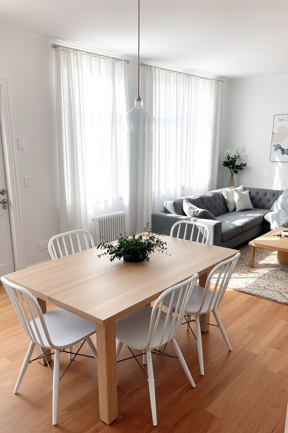 A serene Scandinavian dining room featuring a light wooden table surrounded by minimalist white chairs. Soft natural light filters through sheer curtains, illuminating a simple centerpiece of greenery. The living room showcases a cozy arrangement with a plush gray sofa and a stylish armchair. A neutral area rug anchors the space, complemented by a wooden coffee table and a wall adorned with abstract art.