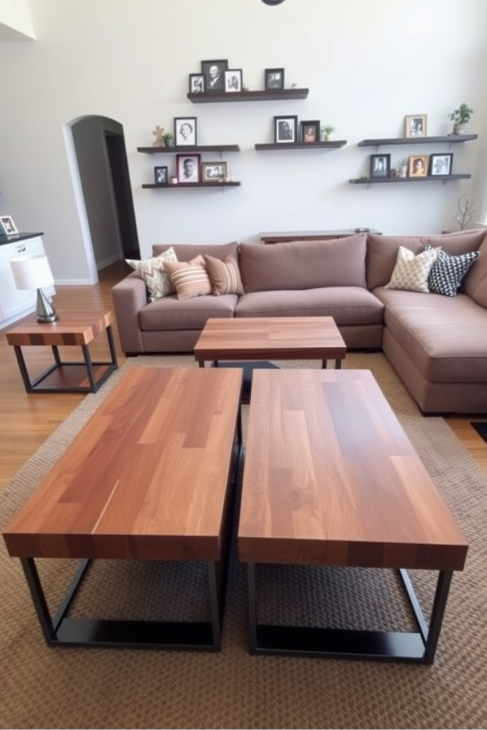 Sleek side tables made of polished wood with minimalist metal accents are positioned on either side of a comfortable sectional sofa. The room features soft neutral tones with a cozy area rug and large windows that allow natural light to fill the space. A simple family room design includes a large, inviting couch with colorful throw pillows and a central coffee table made of reclaimed wood. Wall-mounted shelves display family photos and decorative items, creating a warm and welcoming atmosphere.