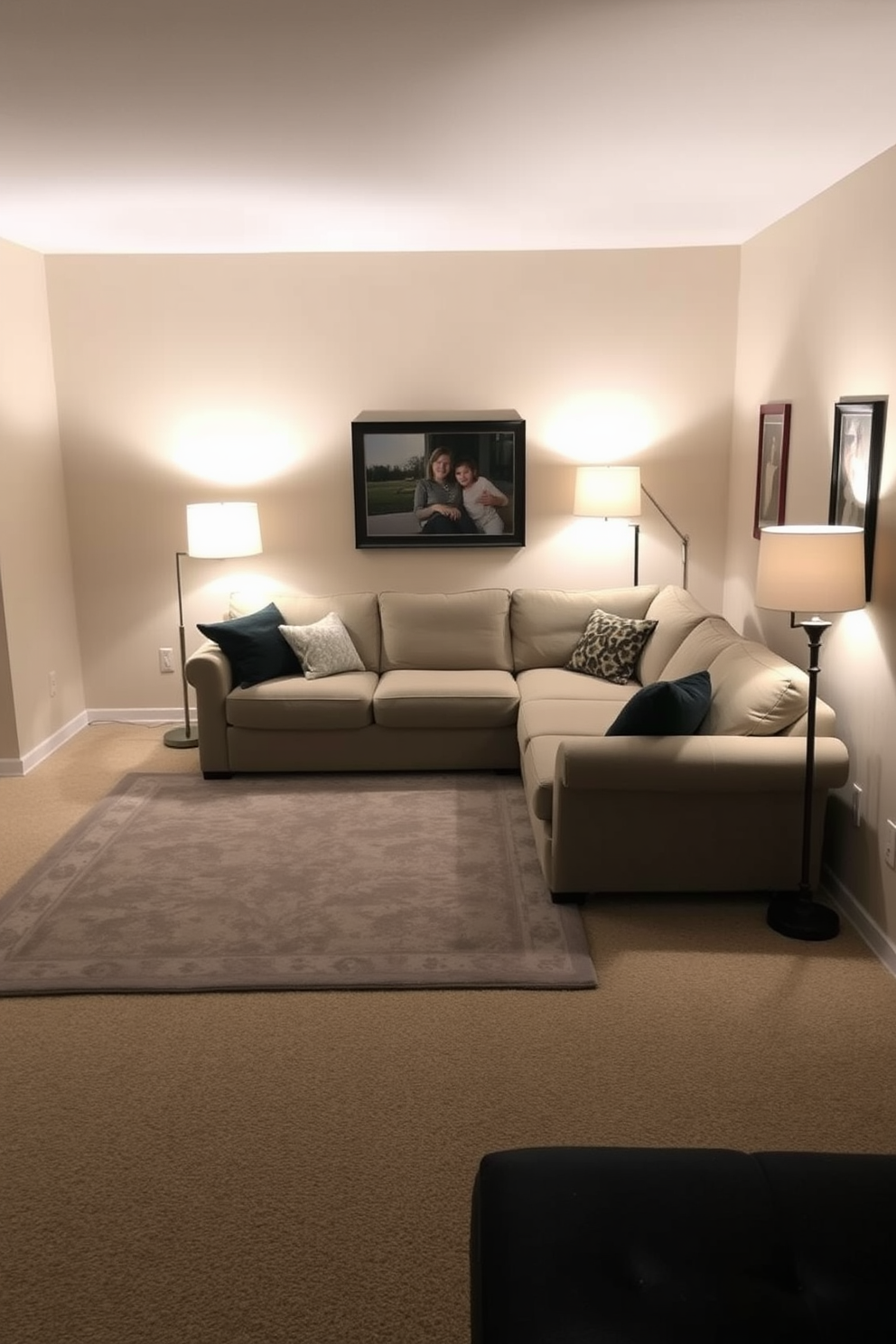 Soft lighting creates a warm and inviting atmosphere in a simple family room. The space features a cozy sectional sofa in a neutral tone, paired with a large area rug that adds texture and comfort. A pair of stylish floor lamps flanks the sofa, providing gentle illumination for reading and relaxation. The walls are painted in a soft beige, complemented by framed family photos that add a personal touch to the decor.