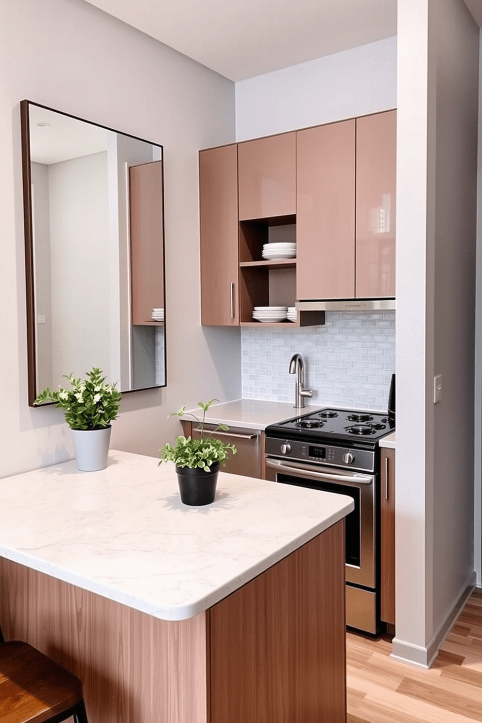 A modern small apartment kitchen featuring sleek cabinetry and a compact dining nook. The walls are painted in a light gray tone, and a large mirror is mounted above the countertop to enhance the sense of space. The kitchen island is topped with a polished quartz surface, complementing the stainless steel appliances. Open shelving displays stylish dishware, and a potted herb plant adds a touch of greenery to the design.