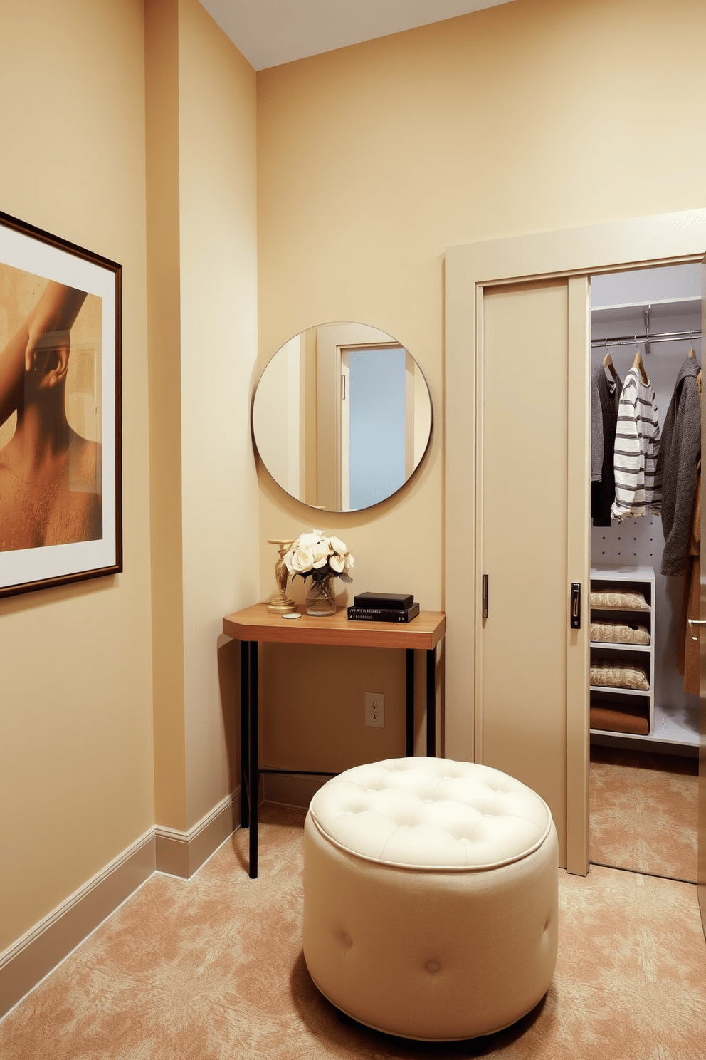 Create a cozy dressing area featuring a plush stool upholstered in soft fabric. The walls are painted in a warm beige, and a large round mirror is mounted above a slim console table. Incorporate a small closet with sliding doors that blend seamlessly into the wall. The closet interior is organized with shelves and hanging space, providing a functional yet stylish storage solution.