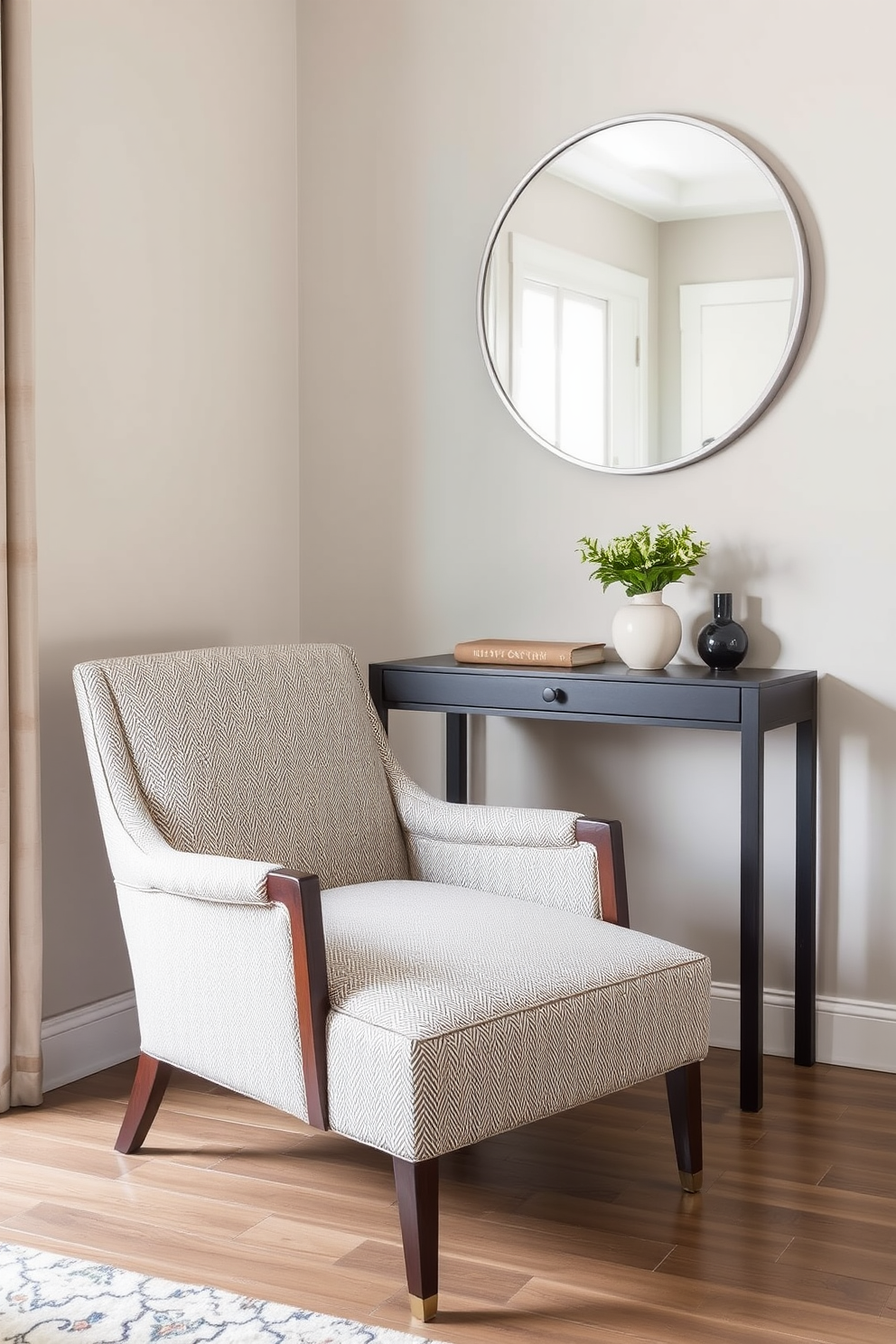 A stylish accent chair upholstered in soft fabric sits in a cozy corner, inviting relaxation and comfort. The chair features elegant wooden legs and a subtle pattern that complements the surrounding decor. In a small entryway, a compact console table with a sleek design provides essential storage without overwhelming the space. Above the table, a round mirror reflects light and creates an illusion of depth, enhancing the welcoming atmosphere.