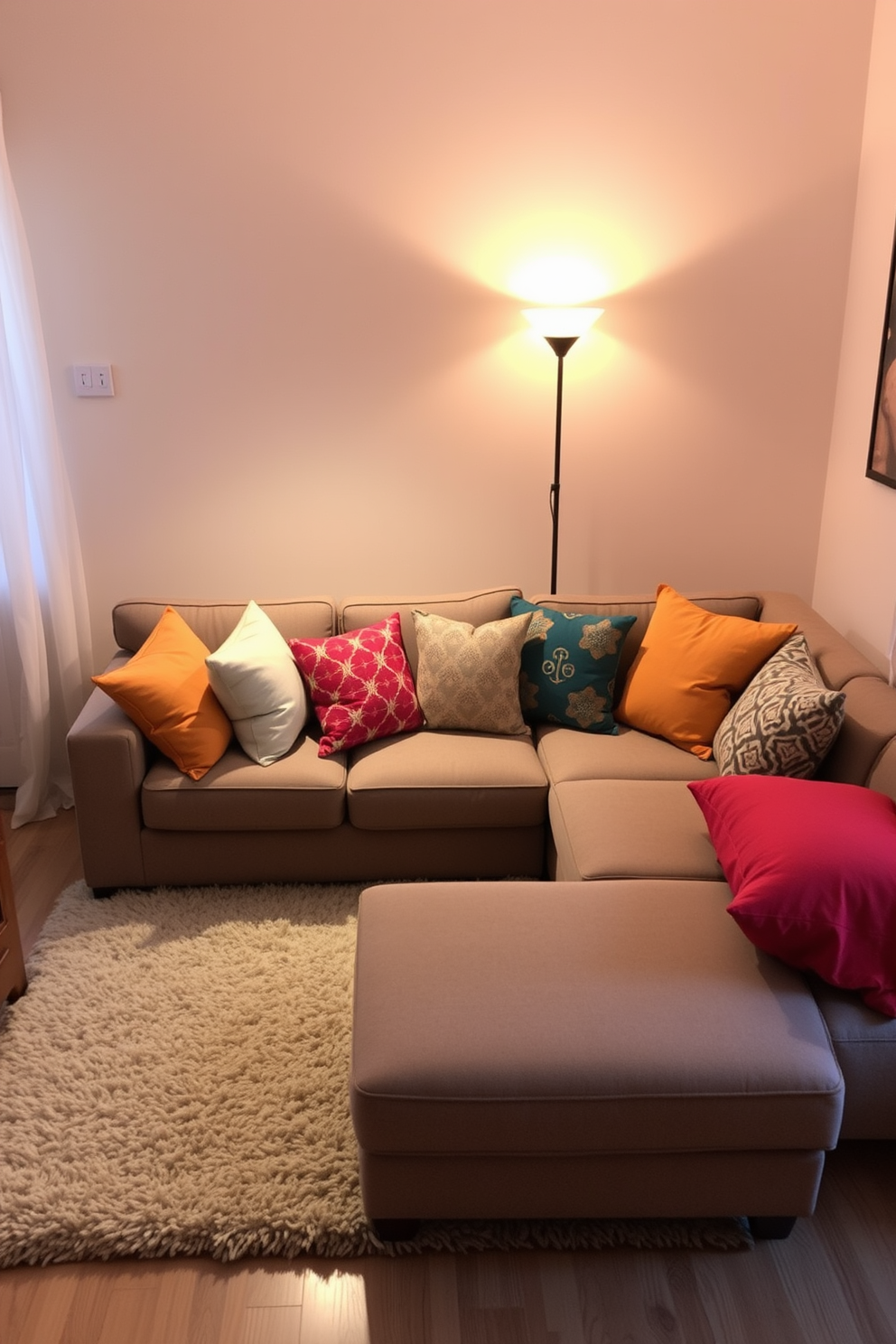 A cozy sectional sofa is positioned in the center of a small family room, adorned with an array of colorful cushions that add vibrancy to the space. Soft lighting from a stylish floor lamp creates a warm ambiance, while a plush area rug anchors the seating area and enhances comfort.