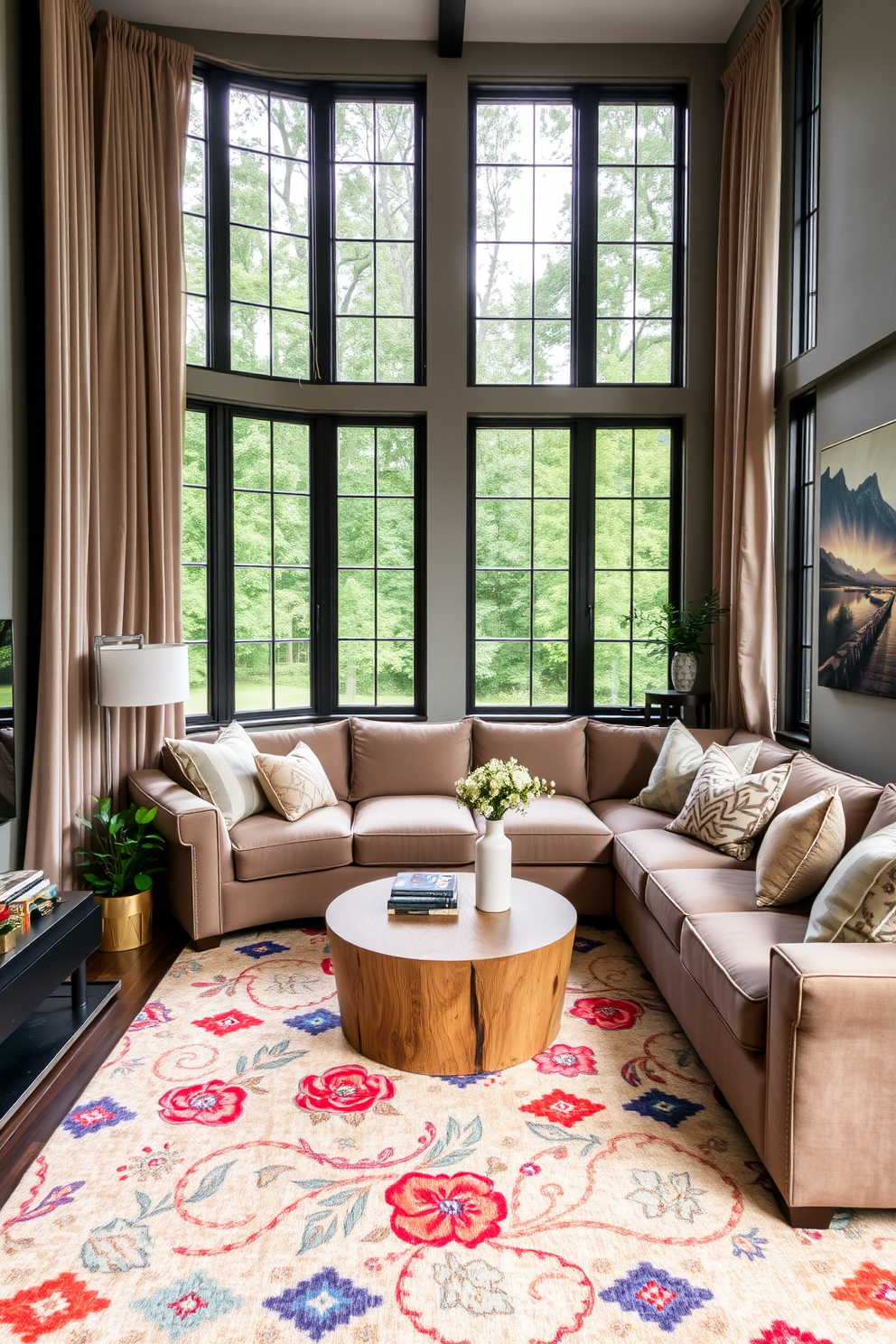 A cozy small family room that features large windows framed with elegant curtains. The room includes a plush sectional sofa in a soft fabric, a round coffee table made of reclaimed wood, and a colorful area rug that adds warmth to the space.