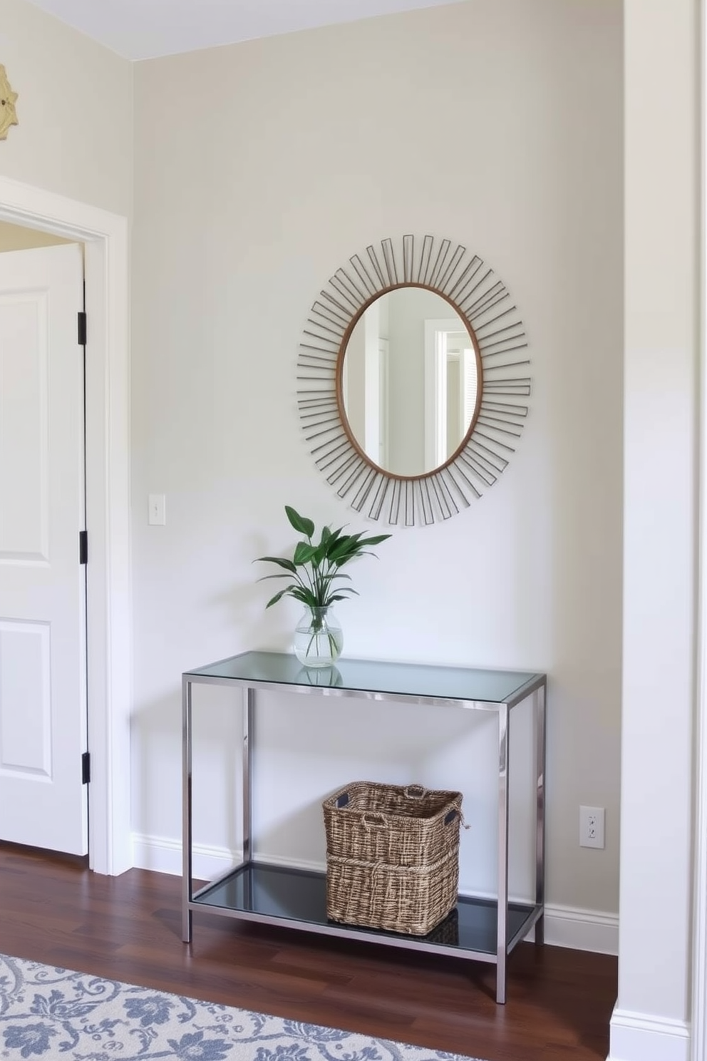 A small foyer with walls painted in light neutral colors creates an inviting atmosphere. A sleek console table with a decorative mirror above it enhances the space, while a small potted plant adds a touch of greenery.