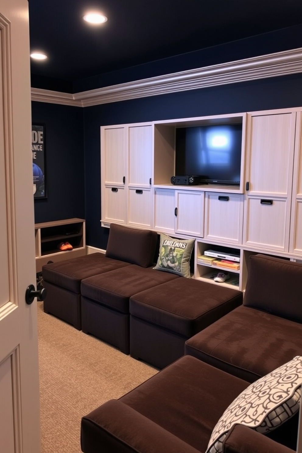 A cozy game room designed for optimal entertainment. The space features hidden storage solutions seamlessly integrated into the furniture to keep gaming accessories organized and out of sight. The walls are painted in a deep navy blue, creating a calming atmosphere. Plush seating options with built-in compartments provide comfort while maintaining a tidy environment.